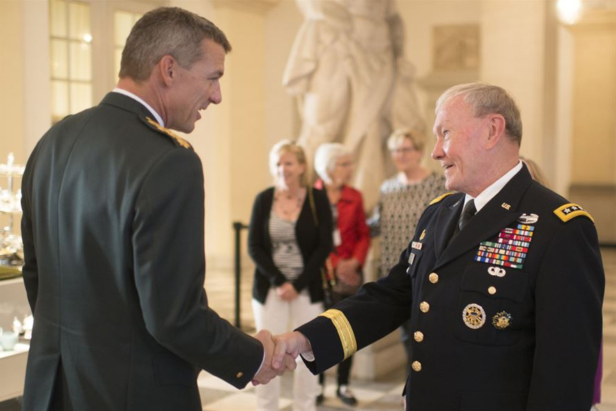 Danish Chief of Defense Gen. Peter Bartram and U.S. Army Gen. Martin E. Dempsey, chairman of the Joint Chiefs of Staff, shake hands as they conclude their visit in Copenhagen, Denmark, Aug. 18, 2015.