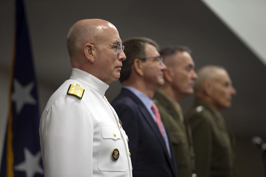 Navy Admiral Kurt W. Tidd, Defense Secretary Ash Carter, Marine Corps Gen. Joseph F. Dunford Jr., chairman of the Joint Chiefs of Staff, and Marine Corps General John F. Kelly stand at front with the official party for the change command ceremony of U.S. Southern Command