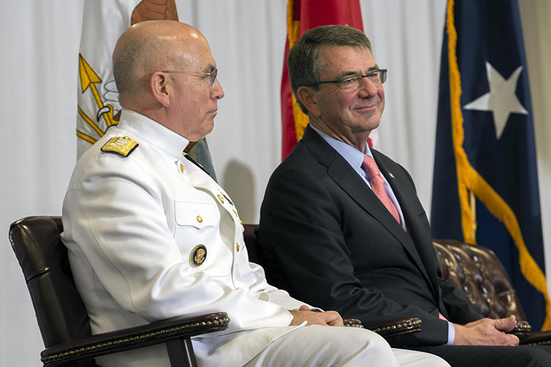 Defense Secretary Ash Carter and U.S. Navy Adm. Kurt W. Tidd smiling together