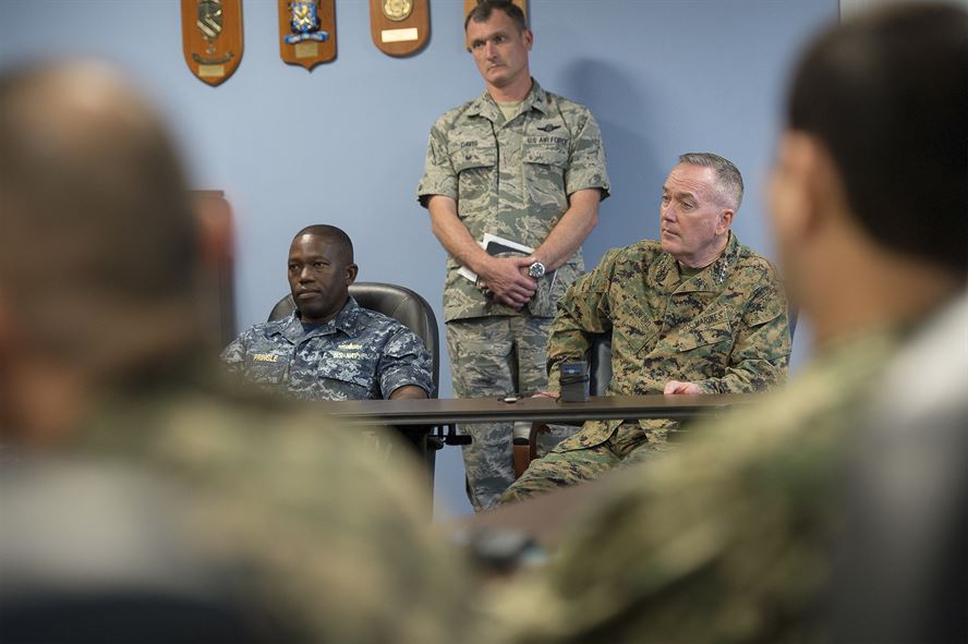 Marine Corps Gen. Joseph F. Dunford Jr., chairman of the Joint Chiefs of Staff, talks with liaison officers