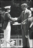 One of the first female cadets receives a diploma from the U.S. Militry Academy during the graduation ceremony May 28, 1980, at West Point, N.Y.