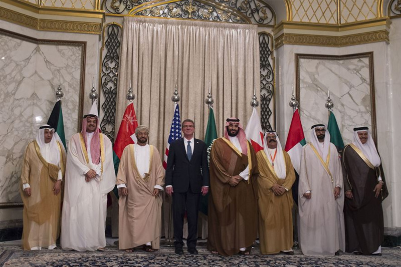 Defense Secretary Ash Carter posing for a photo with Gulf Cooperation Council defense ministers.