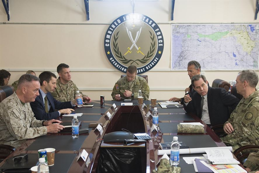 Marine Corps Gen. Joe Dunford, chairman of the Joint Chiefs of Staff, left, meets with U.S. Ambassador to Iraq, Stuart Jones, second from right, and Army Lt. Gen. Sean McFarland, commander, Combined Joint Task Force - Operation Inherent Resolve