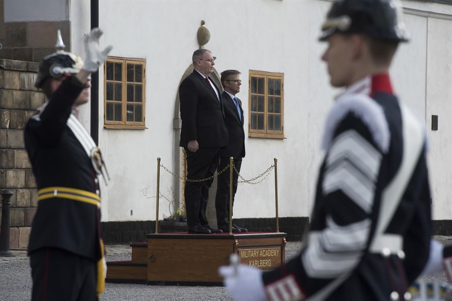 Deputy Defense Secretary Bob Work stands with Swedish State Secretary Jan Salestrand