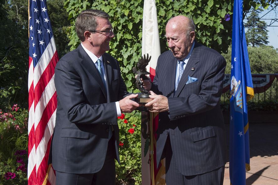 Defense Secretary Ash Carter presents former Secretary of State George P. Shultz with the Innovators in Defense, Enterprise, Academia and Science award