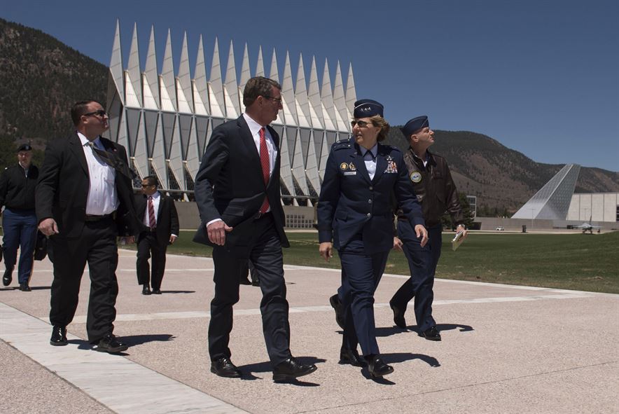 Defense Secretary Ash Carter walks with Air Force Lt. Gen. Michelle Johnson