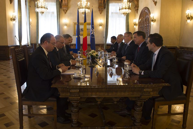 Deputy Defense Secretary Bob Work attends a bilateral meeting with Romanian President Klaus Iohannis