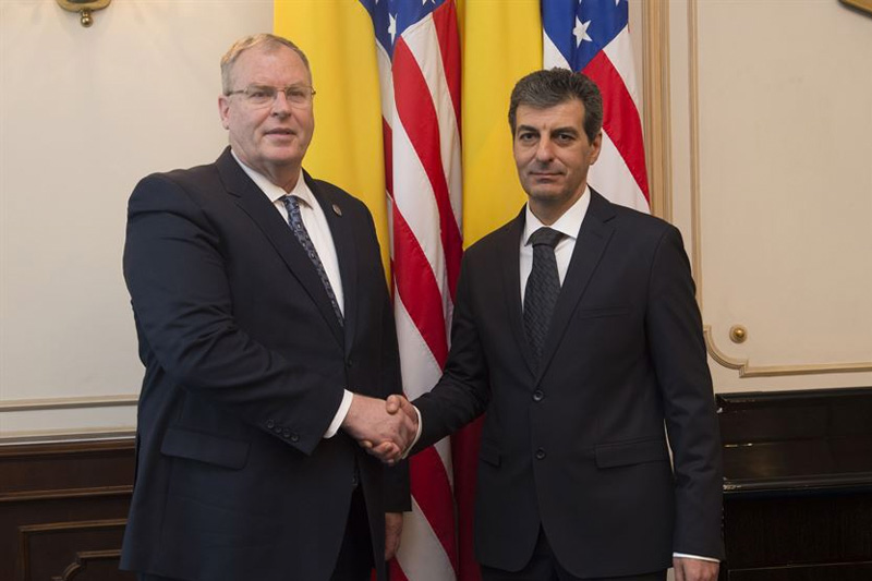 Deputy Defense Secretary Bob Work poses for a photograph with Romanian Defense Minister Mihnea Motoc