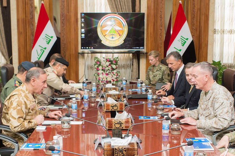 Marine Corps Gen. Joe Dunford, chairman of the Joint Chiefs of Staff, meets with Iraqi Defense Minister Khaled al-Obaidi in Baghdad.