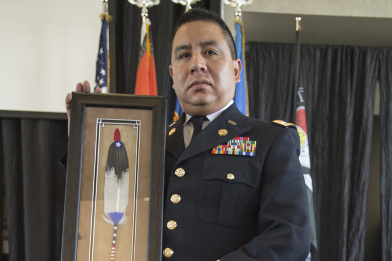 Oklahoma Army National Guardsman Capt. Warren Queton of Blanchard, Oklahoma, receives the 2016 Society of American Indian Government Employees Military Meritorious Service Award.