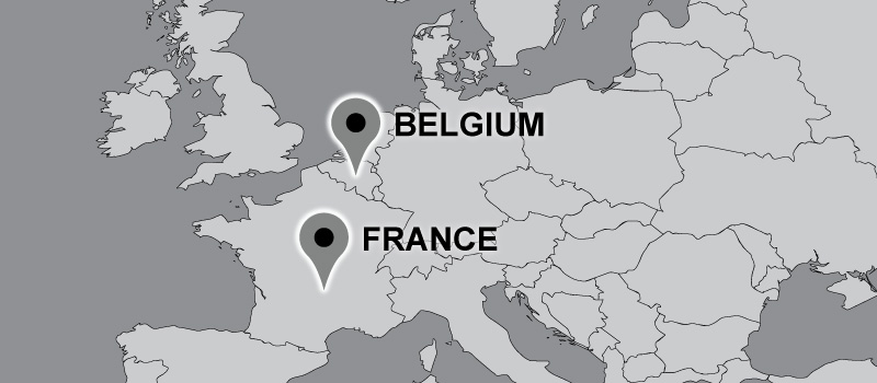 Travel map with pins on France and Belgium.