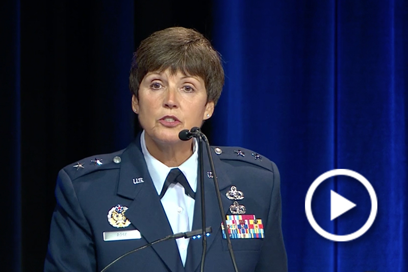 Air Force Maj. Gen. Patricia A. Rose speaking at a podium.