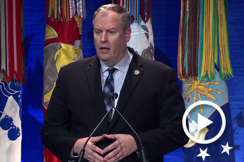 Screengrab of Deputy Secretary of Defense Bob Work speaking at a podium.