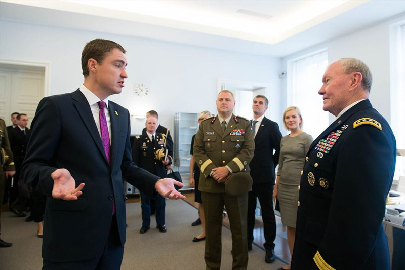 Estonian Prime Minister, Taavi Roivas, left, speaking with U.S. Army Gen. Martin E. Dempsey, chairman of the Joint Chiefs of Staff.