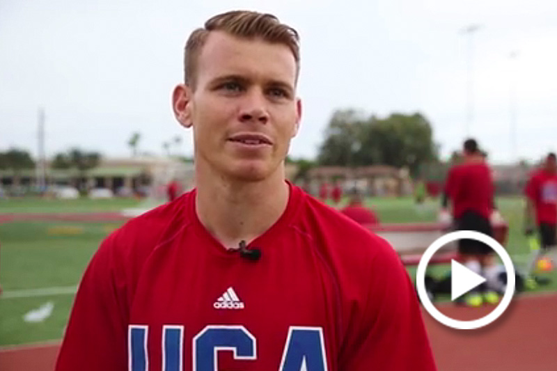Screengrab of blond male athlete wearing U.S.A. team shirt