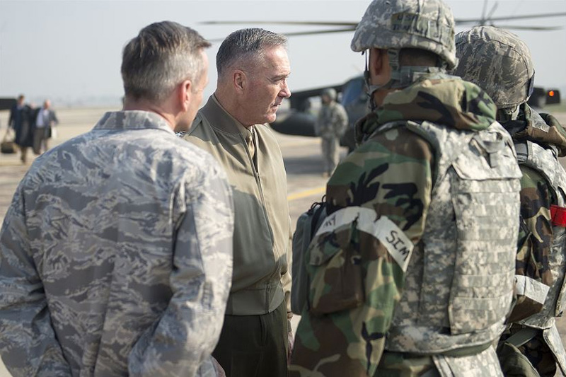 U.S. Marine Corps Gen. Joseph F. Dunford Jr., chairman of the Joint Chiefs of Staff, speaking with U.S. Air Force Lt. Gen. Terrence O'Shaughnessy, commander, 7th Air Force and Air Component Command U.S. Forces Korea/U.S. Combined Forces.