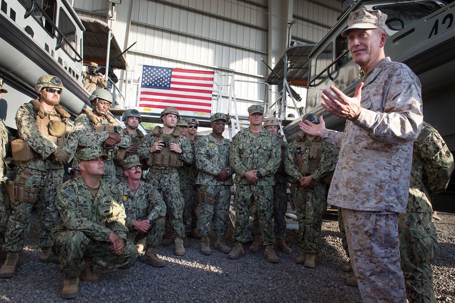 U.S. Marine Gen. Joseph F. Dunford Jr., chairman of the Joint Chiefs of Staff, talks with U.S. sailors