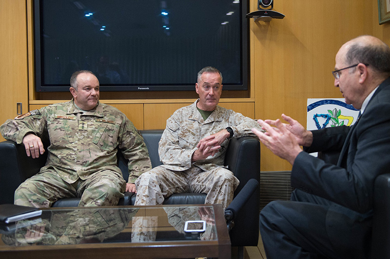 Marine Corps Gen. Joseph F. Dunford Jr., center, chairman of the Joint Chiefs of Staff, and Air Force Gen. Philip M. Breedlove, left, NATO's supreme allied commander for Europe and commander of U.S. European Command, sitting on a couch meeting with Israeli Defense Minister Moshe Yaalon.