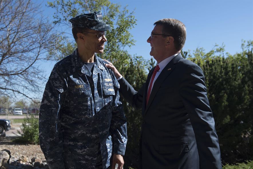 Navy Adm. Cecil D. Haney, commander of U.S. Strategic Command, greets Defense Secretary Ash Carter 