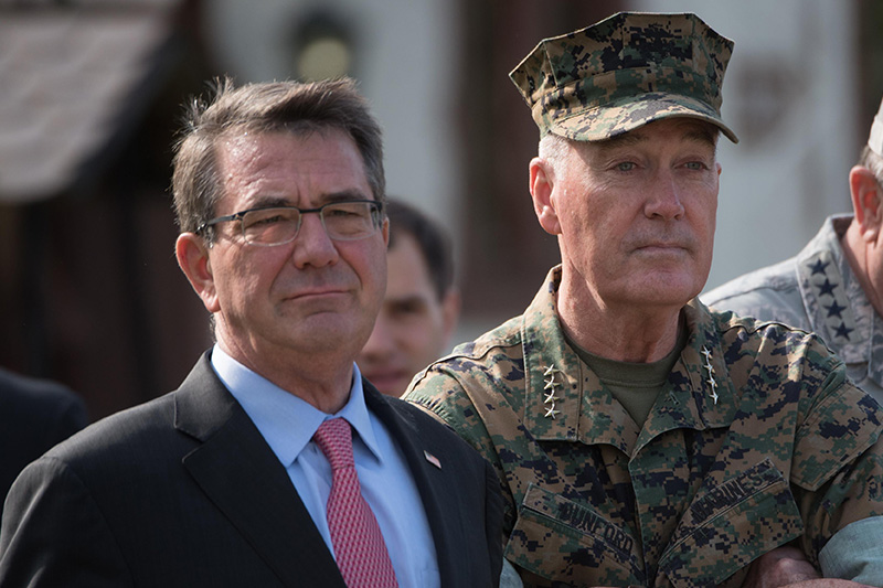 Defense Secretary Ash Carter and Marine Corps Gen. Joe Dunford, chairman of the Joint Chiefs of Staff, waiting to begin a change-of-command ceremony.