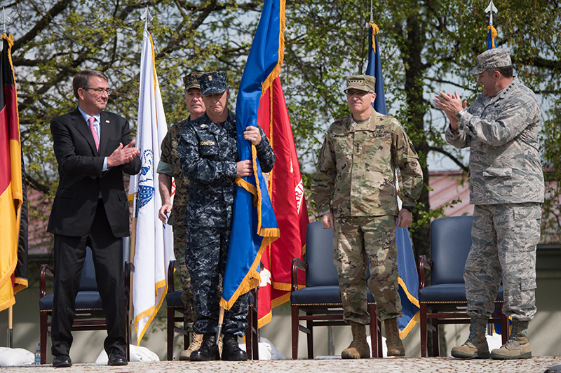 Defense Secretary Ash Carter, Marine Corps Gen. Joe Dunford, second from left, chairman of the Joint Chiefs of Staff, and Air Force Gen. Phillip M. Breedlove, outgoing commander of U.S. European Command, applauding Army Gen. Curtis M. Scaparrotti, second from right, the command's new commander.