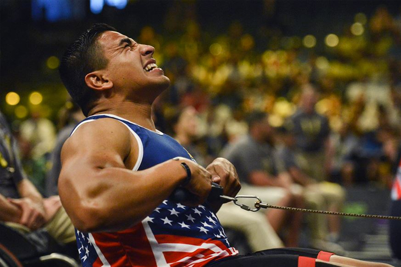 Marine Corps Staff Sgt. Rafael Cervantes competes in a rowing event