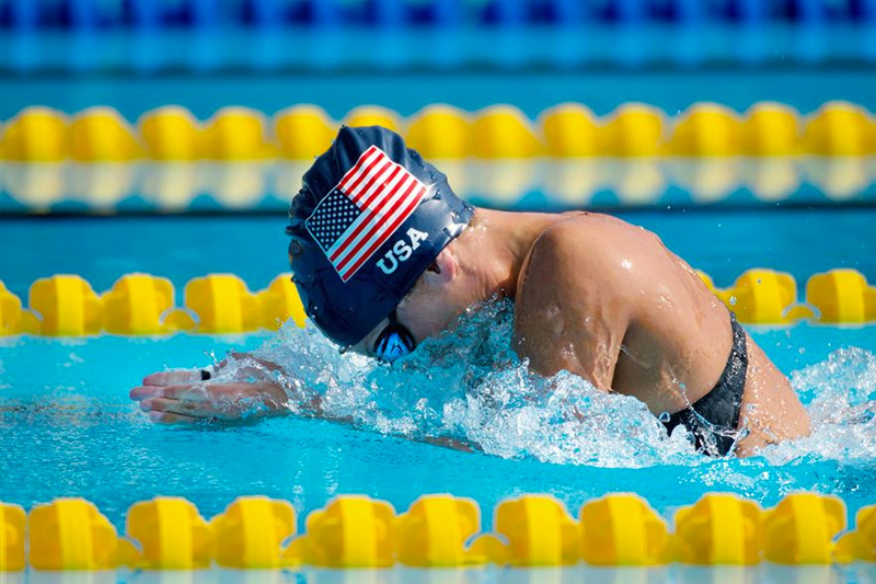 Army Sgt. Elizabeth Marks competes in the women’s breaststroke swimming finals