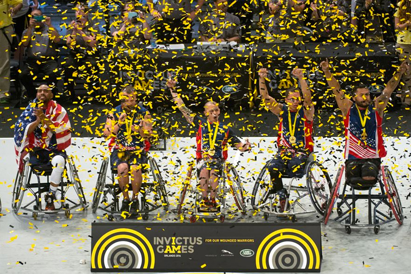 U.S. wheelchair basketball team members celebrate their gold medal win