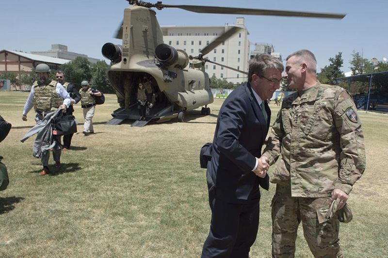 Defense Secretary Ash Carter exchanges greetings with Army Gen. John W. Nicholson, commander of the Resolute Support mission, in Kabul, Afghanistan.