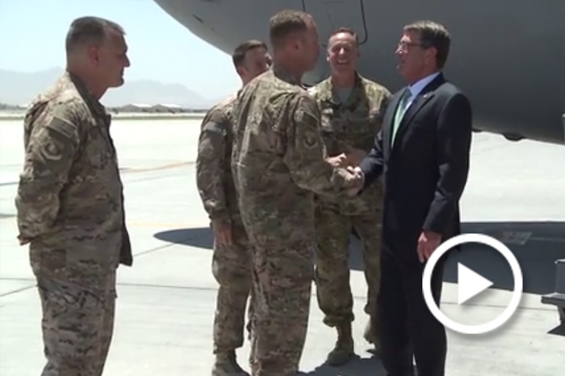 Screen grab of Defense Secretary Ash Carter shaking hands with troops.