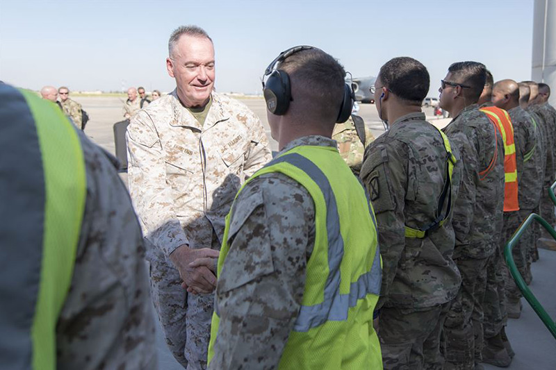 Marine Corps Gen. Joe Dunford, chairman of the Joint Chiefs of Staff, speaks with service members.