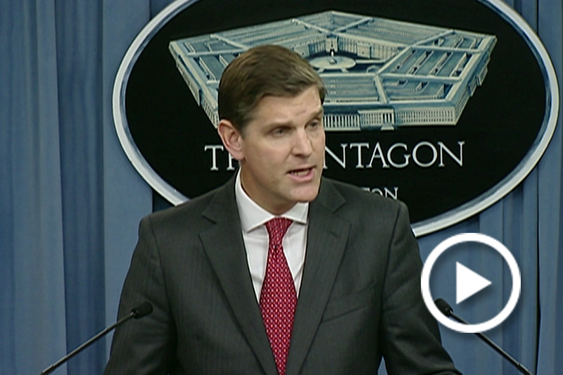 Pentagon Press Secretary Peter Cook briefing reporters.